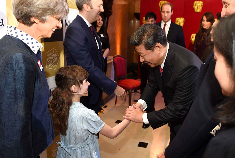 10月21日，國家主席習近平和夫人彭麗媛在英國威廉王子夫婦陪同下，出席在倫敦舉行的中英創(chuàng)意產(chǎn)業(yè)展。新華社記者 張鐸 攝