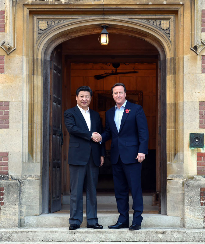 10月22日，國(guó)家主席習(xí)近平在契克斯首相鄉(xiāng)間別墅同英國(guó)首相卡梅倫再次會(huì)晤。新華社記者 饒愛(ài)民 攝