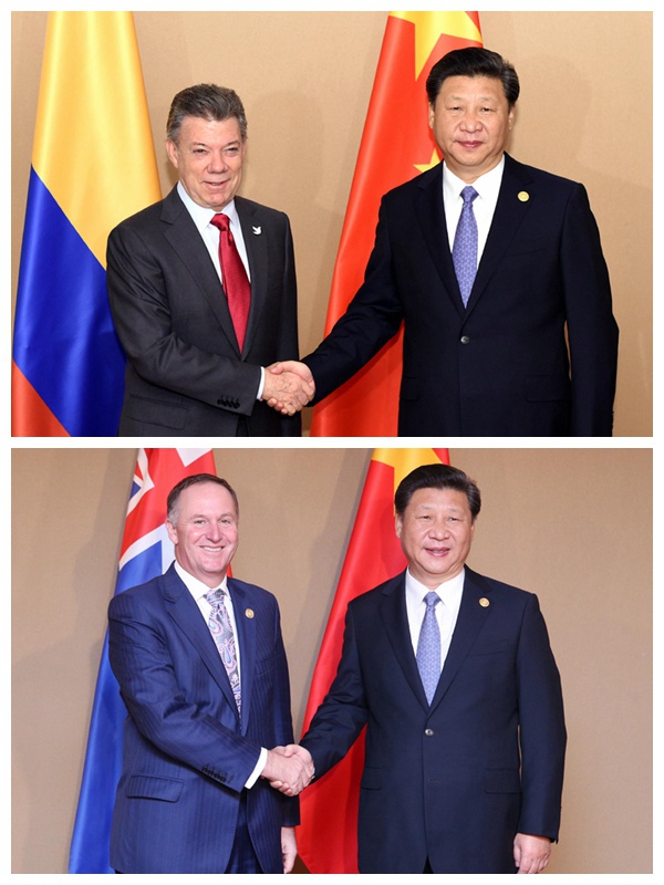 11月18日，國(guó)家主席習(xí)近平在菲律賓馬尼拉會(huì)見哥倫比亞總統(tǒng)桑托斯、新西蘭總理約翰·基。新華社記者 饒愛民、姚大偉 攝