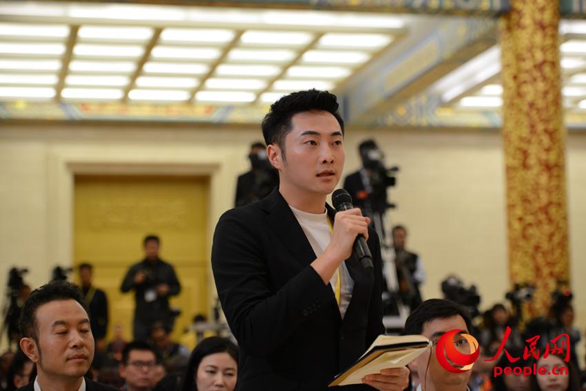 人民日報、人民網(wǎng)、人民日報客戶端記者提問（人民網(wǎng) 張啟川攝）