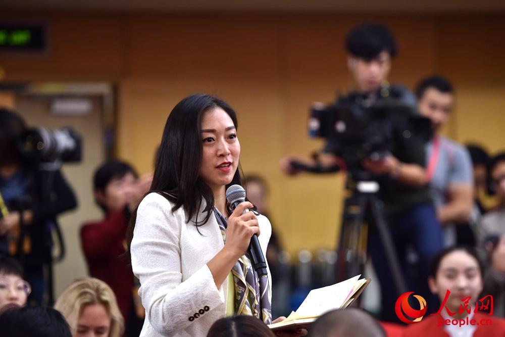 圖：人民日報記者提問