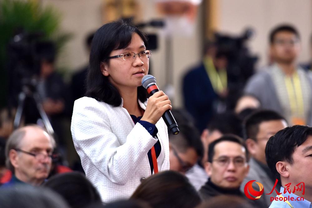 圖：新華社記者提問