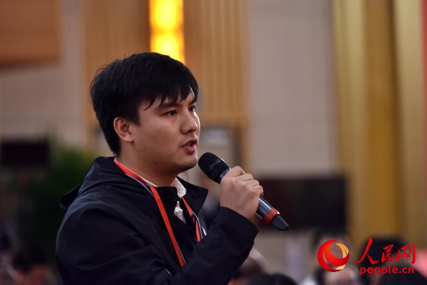 圖：中國消費者報社記者提問