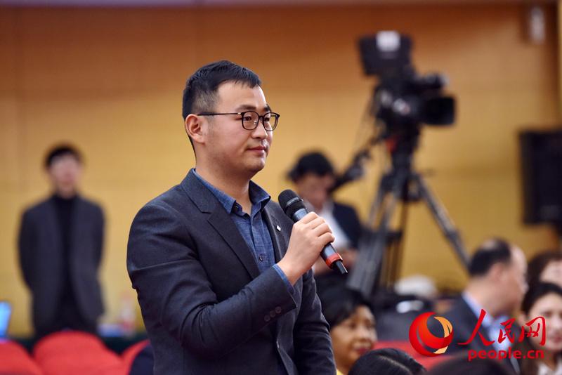 圖：中央人民廣播電臺記者提問