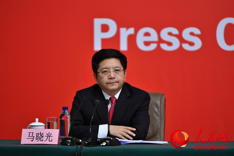 圖：主持人、十九大新聞中心負責人馬曉光
