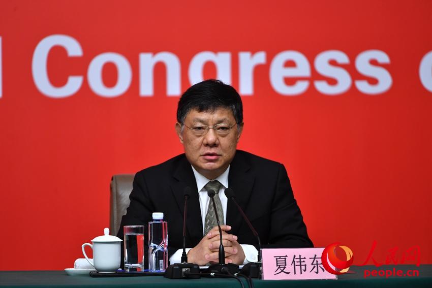 圖：中央文明辦專職副主任夏偉東介紹情況