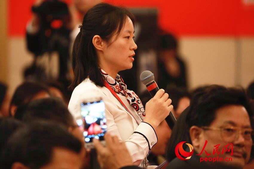 圖：新華社記者提問
